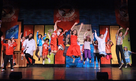 Actors in High School Musical Jr costumes