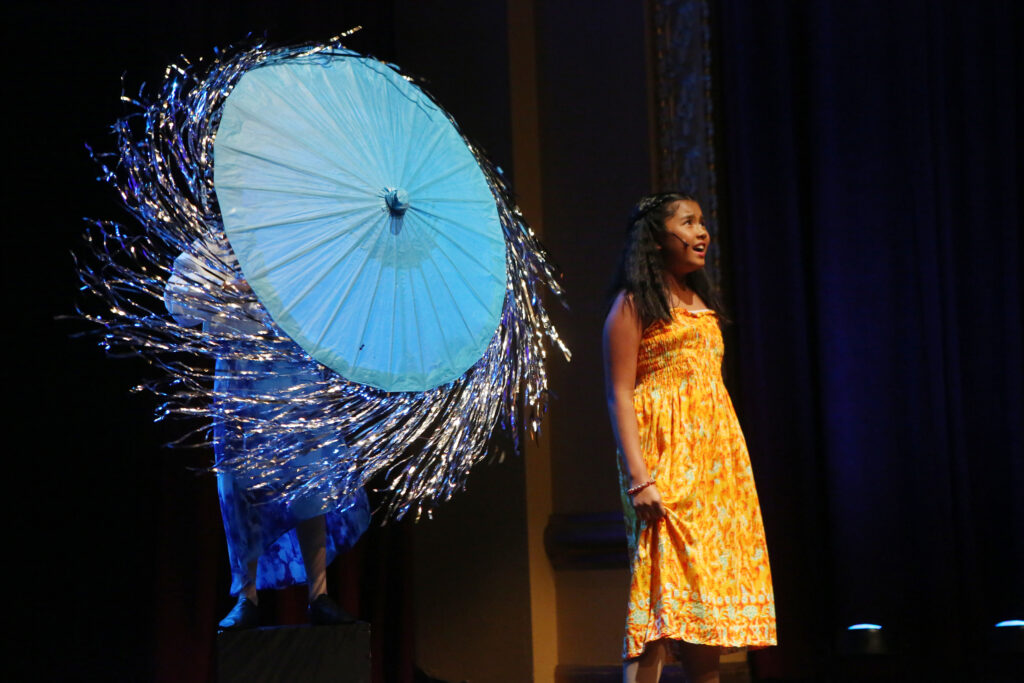 Kids performing in Moana