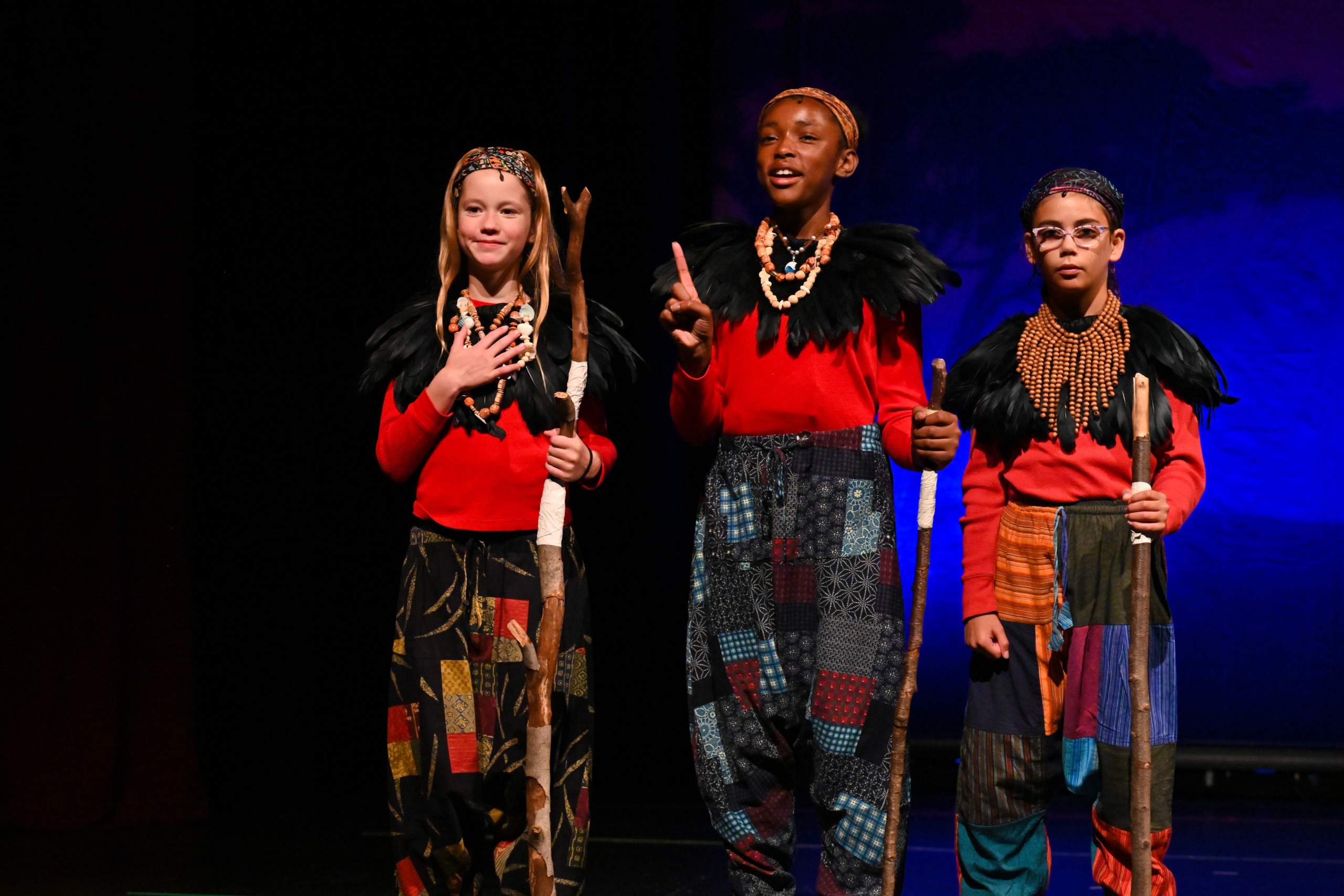 Cast members performing in The Lion King Kids